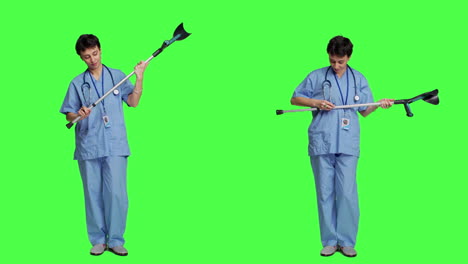 Hospital-staff-worker-assembling-crutches-to-help-with-mobility-and-healing